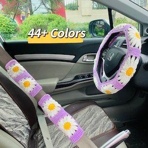 Funda de volante de crochet hecha a mano para mujer, bonita funda de cinturón de seguridad con margaritas, accesorios decorativos para el interior del coche.