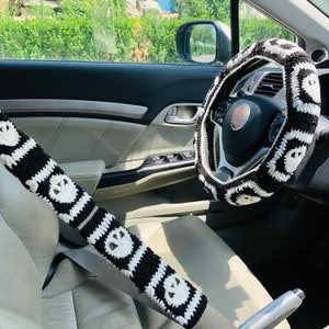 Coprivolante fatto a mano Copri cintura di sicurezza all'uncinetto con teschio nero, decorazioni per accessori auto all'uncinetto per le donne
