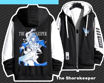 May include: Black and white zippered hoodie with a blue and white graphic print of a female character on the back. The text "The Shorekeeper" is printed on the front of the hoodie.