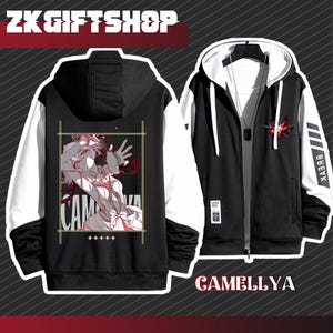 Könnte beinhalten: Schwarz-weißer Kapuzenpullover mit Reißverschluss. Die linke Seite des Pullovers hat ein weißes Feld mit einer schwarzen Grafik eines Anime-Charakters. Die rechte Seite des Pullovers hat ein schwarzes Feld mit weißem Text, der "BREAK" sagt. Der Text "CAMELYYA" ist in Weiß auf schwarzem Hintergrund unter dem Pullover gedruckt.