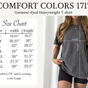 May include: A dark gray Comfort Colors 1717 heavyweight t-shirt. The image includes a size chart with measurements in inches, and a model wearing the shirt. The text on the image reads "COMFORT COLORS 1717" and "Garment-dyed Heavyweight T-shirt."