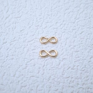 Ciondolo a forma di infinito placcato oro - Materiali per la creazione di gioielli