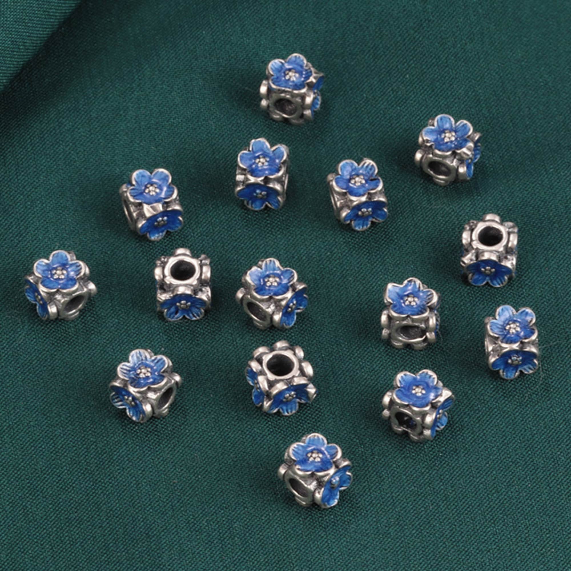 Anello in argento con cammei floreali realizzati a mano su conchiglia Anello in argento con cammei floreali realizzati a mano su conchiglia
