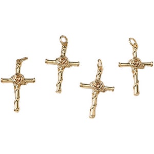May include: Four gold-tone cross charms with a rose design. Each charm has a loop at the top for attaching to a necklace or bracelet.