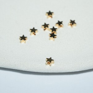 Perline a forma di stella dorate, in ottone placcato oro 14 carati, accessori per la creazione di gioielli, ciondoli celesti, distanziatori, componenti a forma di stella