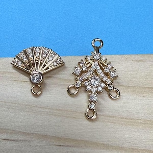 Charm chapado en oro con circonitas cúbicas, Árbol de la Vida, Delfín, Corazón