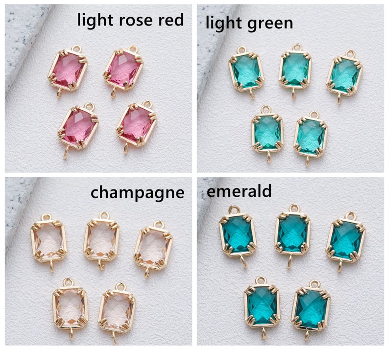 May include: Four sets of gold-toned metal charms with a rectangular glass stone. The stones are in four colours: light rose red, light green, champagne, and emerald.