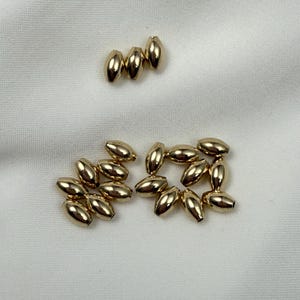 14K gold filled ovale gierstkralen, benodigdheden voor het maken van armbanden (3 x 5 mm, 4 x 6 mm)