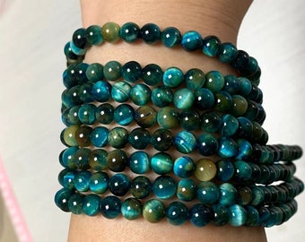 Blue tiger eye gemstone beads. 6mm 8mm 10mm 12mm  round beads .  4A Optimized Dyed Treated Blue tiger eye beads  quality beading supplies.