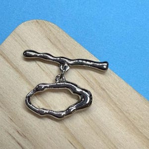 Conjunto de fecho de alternância irregular banhado a ouro 18K