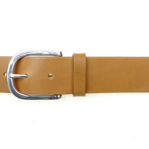 Leather belt with silver-plated brass belt buckles available in black and brown. Women&#39;s belts | Men&#39;s belts