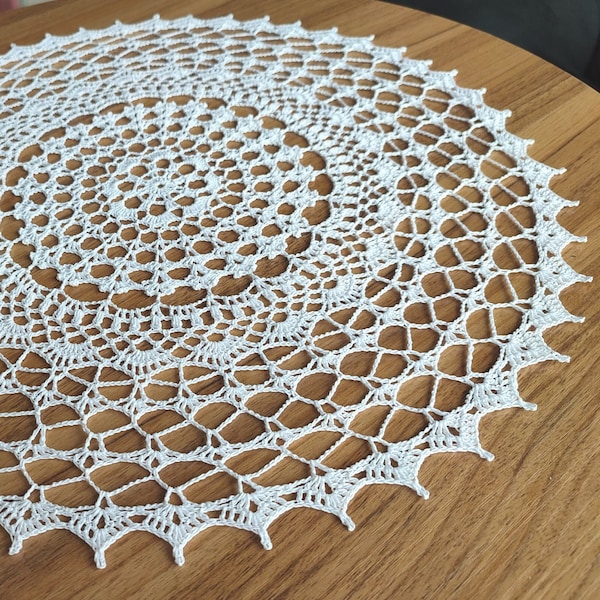 White round crochet doily for vintage inspired table decoration