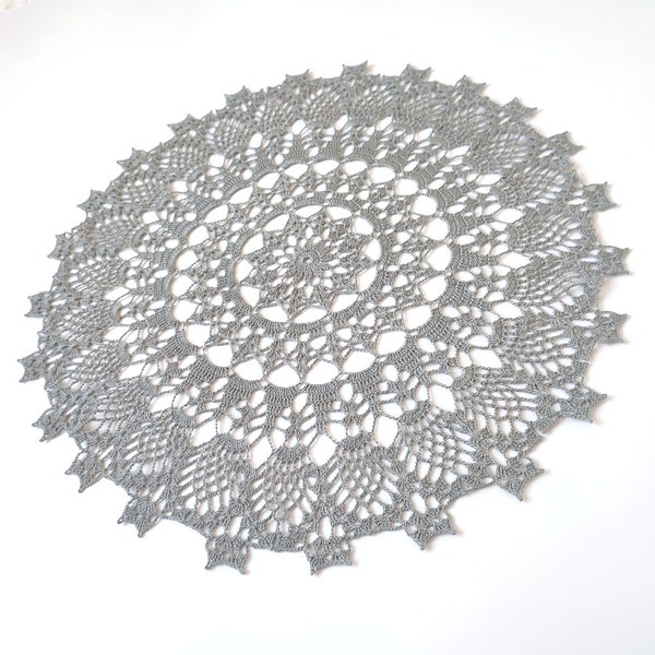 Delicate silver grey lace doily