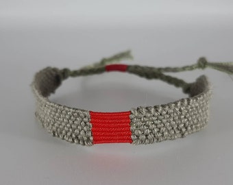 The "Poppy in a wheat field": Hand-woven bracelet in almond green linen and old red thread, for men and women