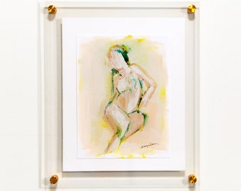 May include: A framed abstract painting of a nude figure in a seated pose. The figure is painted in shades of pink and green against a yellow and pink background.