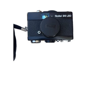 Vintage Rollei 35 LED-camera met 100 XL flitser en tas, niet getest