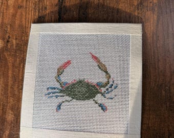 Tela a punto croce con granchio costiero