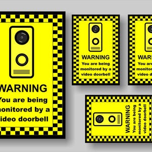 May include: Four yellow and black warning signs with a black and white chequered border. Each sign has a black silhouette of a video doorbell and the text "WARNING You are being monitored by a video doorbell".