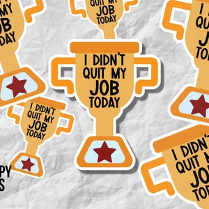 May include: Five gold trophy stickers with the text "I didn't quit my job today". Each sticker has a red star on the base.