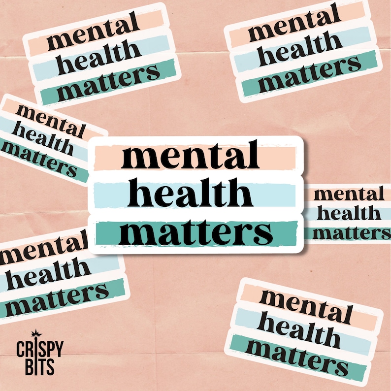May include: Six stickers with the text "mental health matters" in black text on a background of pink, blue, and green stripes. The stickers are arranged in a random pattern on a pink background.