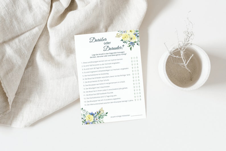 May include: A printable bridal shower game with a floral design. The game is called "Dar&uuml;ber oder Darunter?" and asks players to guess if the bride's answers to various questions are above or below a certain number.