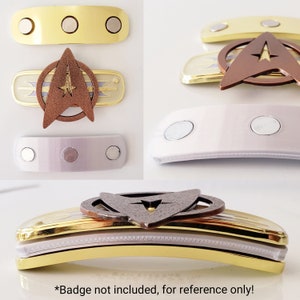 Puede incluir: Un conjunto de tres cierres magn&eacute;ticos para una insignia de uniforme de Star Trek. Los cierres son dorados, plateados y una combinaci&oacute;n de ambos. Los cierres est&aacute;n dise&ntilde;ados para ser usados con una insignia de uniforme de Star Trek, pero la insignia no est&aacute; incluida. *Insignia no incluida, solo para referencia!*