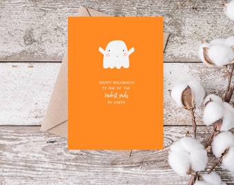 May include: Orange Halloween card with a white ghost illustration and the text "Happy Halloween to one of the kindest souls on Earth."