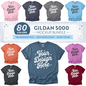 Peut inclure: Une collection de t-shirts Gildan 5000 dans diverses couleurs, notamment rose, gris foncé, gris clair, bleu clair, orange, bleu, violet et bordeaux. Chaque t-shirt porte le texte Your Design Here avec de petites étoiles en blanc ou noir.
