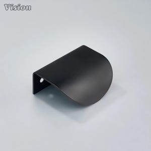 May include: A black cabinet pull with a curved, semi-circular design. The pull has a small, rectangular base with a single hole for mounting. The word "Vision" is printed in white in the upper left corner.