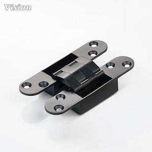 Pode incluir: Uma dobradiça oculta de metal preto fosco com um mecanismo de pivô central e quatro placas de montagem planas com orifícios para parafusos escareados pré-perfurados. A palavra Vision está impressa no canto superior esquerdo em branco.
