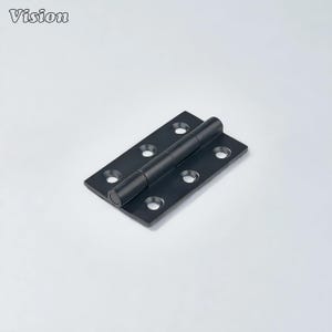 May include: A black metal hinge with multiple screw holes and a cylindrical barrel. The word "Vision" is in the upper left corner. The hinge is designed for use in cabinetry or doors.