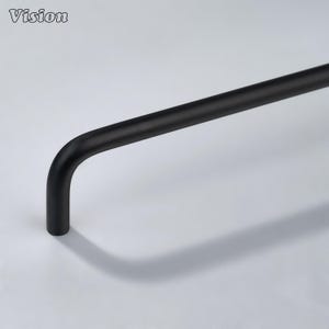 May include: A matte black metal cabinet handle with a smooth, cylindrical bar design and a curved end. The hardware features a clean, minimalist aesthetic with a uniform dark finish, suitable for attachment to drawers or cabinet doors.