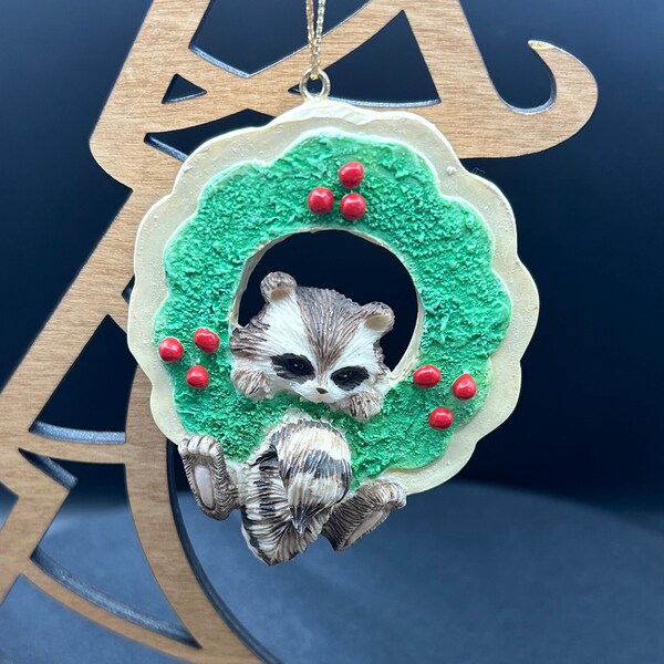 Charming Tails/87/301/Christmas Cookies Ornament/Racoon in wreath Christmas cookie Ornament/Ornment