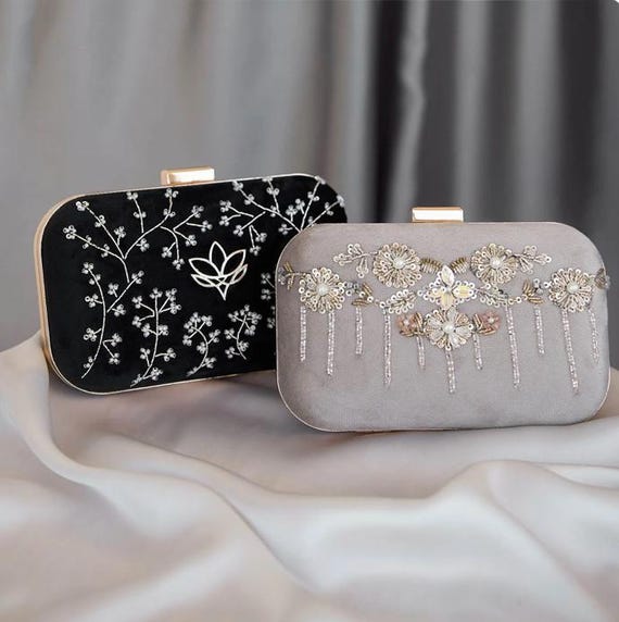 Black floral clutch bag hotsell