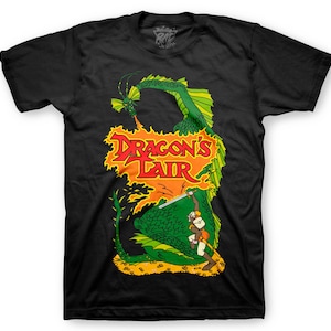May include: Black t-shirt with a green dragon and a knight fighting. The text "Dragon's Lair" is printed in red and yellow.