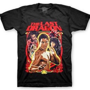 May include: Black t-shirt with a red and yellow graphic of the movie "The Last Dragon". The graphic features the main character, Bruce Leroy, in a fighting pose with other characters from the movie.