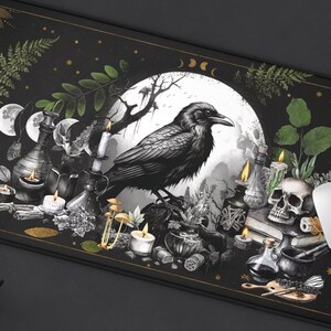 May include: A black and gold mouse pad with a raven, moon, and various mystical symbols. The raven is perched on a branch with its wings spread. The moon is full and surrounded by stars. The symbols include a skull, candles, and herbs.