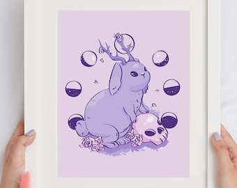 May include: A purple rabbit with antlers sits on a skull with a pink glow. The rabbit is surrounded by a circle of crescent moons in various phases. The background is a light purple.