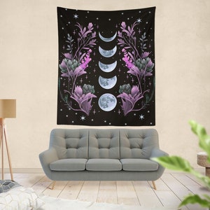 May include: A black tapestry with a floral design and a series of moons in different phases. The flowers are purple and green, and the moons are white.