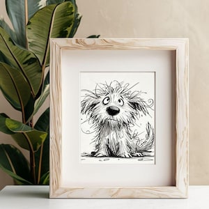 May include: A framed black and white sketch of a shaggy dog with a surprised expression. The dog has a large nose, expressive eyes, and a fluffy coat. The artwork is in a light wood frame, displayed on a white surface, with a green plant in the background.