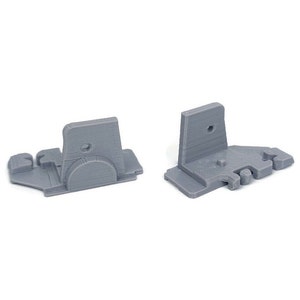 May include: Two gray plastic brackets with a series of small holes and a larger hole in the center. The brackets are designed to be attached to a surface.