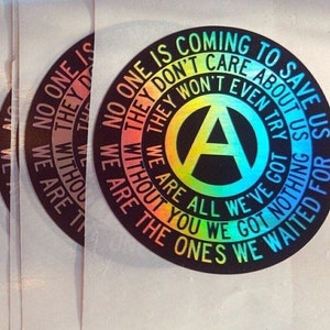 Eggshell Anarchist Sticker: No one is coming to save us. We are all we've got. (Black/Holo, single stickers or packs of 5/10/25/50)