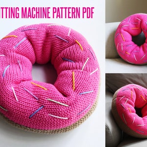 May include: A pink knitted donut pillow with colorful sprinkles. The pillow is made with a knitting machine and is a fun and unique home decor item.