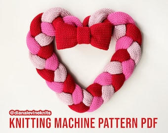 May include: A knitted heart wreath in pink and red with a red knitted bow in the center. The wreath is made on a knitting machine and the pattern is available as a PDF download. The text "@dianalevineknits KNITTING MACHINE PATTERN PDF" is at the bottom of the image.