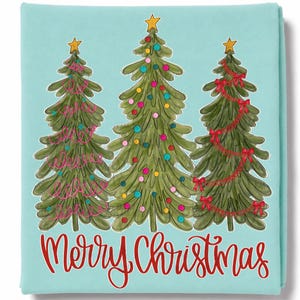 May include: A light blue blanket featuring three green Christmas trees with yellow stars on top. The left tree has pink swirls, the center tree has colorful ornaments, and the right tree has red bows. The text Merry Christmas is written in red.