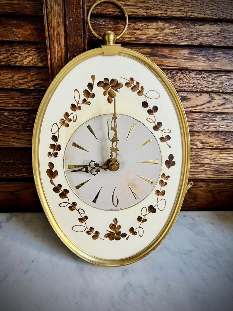 Vintage 70s Oval Gold Wall Clock with Painted Leaf Pattern – Not Working