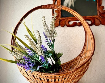 Vintage Large Rattan basket with a circular handle