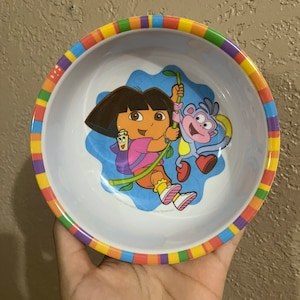 Take a look at ths Dora the Explorer Three-Secton Plate by Zak