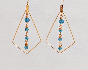 Large Gold Kite Dangle Earrings with Indicolite Blue glass bead Center. Maximalist jewelry for her