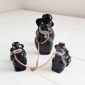 Redware Poodle with Chained Puppies